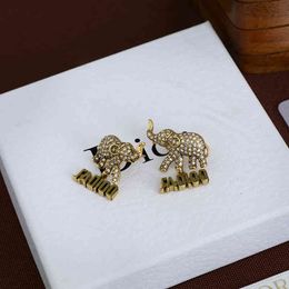 red elephant jewelry Canada - Design jewelry family letter female 2021 fengdijia net red brass diamond Elephant Earrings