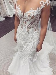 Plus Size Mermaid Wedding Dresses Bridal Gowns Sleeveless Sheer Jewel Neck Lace Appliqued Button Back Arabic Custom Made robe de mariee