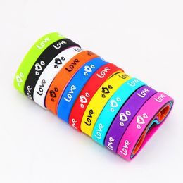 Pack of 100pcs Multicolor Elasticity Jesus Cross Skull Peace Butterfly Etc Style Wrist Cuff Silicone Bracelets For Man Women 21033248y
