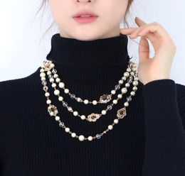 black and white pearl Canada - CSxjd Imitation Pearls Long Necklaces For Women Golden Color Chain Black And White Gem Women's Sweater Necklace Chains