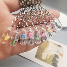 10Pieces/Lot 3pcs Creative simulation capsule villain keychain resin transparent pendant diy jewelry accessories small gifts