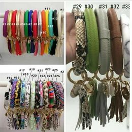 2021 best PU Leather Tassels Bracelet Keychain PU Wrist Key Ring Sunflower Leopard Patterns Bangle Key Holder Dia 8.5cm