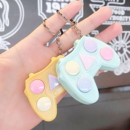 Creative dynamic handheld memory game console keychain training hand-brain puzzle interactive keychain small gifts for students