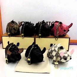 wholesale- Designer Keychains PU Leather Men Women Bag Pendant Jewelry Accessories Letter Print Cartoon Ox Cow Keychains Lovers