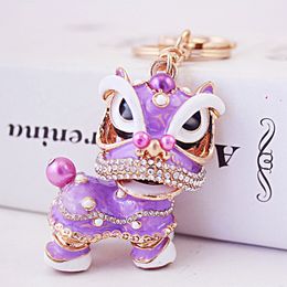 Chinese style creative keychain traditional lion dance alloy dripping oil keychain eye-catching metal auspicious small gift