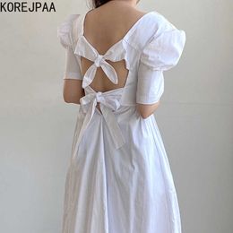 Korejpaa Women Dress Summer Korean Fashion Chic Elegant Solid O Neck Open Back Lace Up Bow Tie Waist Bubble Sleeve Dresses 210526