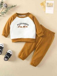 Baby Letter And Dinosaur Print Raglan Sleeve Two Tone Sweatshirt & Sweatpants SHE