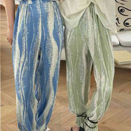 Rendering mulheres moda calças de perna larga verão plissado chique calças coreanas senhoras fina listrada elástica cintura alta 210520