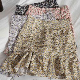 Korean layered fold feeling package hip skirt summer A-Line small fresh floral beach Vintage ruffled short women 210420