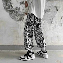 Full print zebra pattern casual pants men's spring and autumn new style Korean loose nine-point pants casual hip hop trousers Y0811