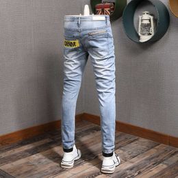 Korean Style Fashion Men Jeans Retro Light Blue Elastic Cotton Ripped Streetwear Printed Designer Hip Hop Pencil Pants MJO1