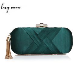 dark green evening bag