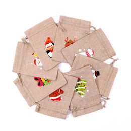 small jute gift bags wholesale UK - 50Pcs Santa Claus Elk Bells Small Bear Drawstring Natural Burlap Bag Jute Gift Bag 10x14cm Cotton Linen Christmas Print Gift Bag 211108