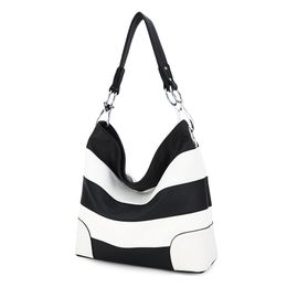 Soft and smooth leather women's shoulder bag black and white stripe Colour matching design large capacity handbag