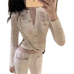 Fashion white hollow jacket female summer sexy long-sleeved cardigan slim top + wide leg pants 2-piece suit 210520