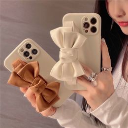 3D luxury leather bow Wrist holder phone case for iphone 11 12 Pro Max X XR XS 7 8 plus Camera soft Protect Cover for iphone 13