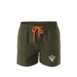 Designers de venda imperdível masculino verão secagem rápida shorts de praia finos moletom fitness academias treino masculino calças curtas tamanho grande 3XL