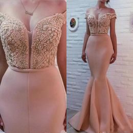 2021 Sexy Blush Pink Mermaid Prom Dresses Off Shoulder Lace Appliques Crystal Beaded Satin Open Back Formal Party Dress Celebrity Evening Gowns