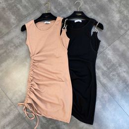 FABPOP Sleevelss Round Collar One Shoulder Metal Chain Strap High Waist Side Drawstring Short Mini Sexy Dress Women GB687 210709