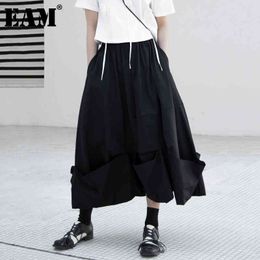 [EAM] Black Casual Irregular Pleated Pockets High Elastic Waist Half-body Skirt Women Fashion Spring Summer 1DD8480 21512