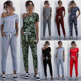 Fashion Women Jumpsuits Casual Summer Solid Oblique Collar Off Shoulder Pockets Short Sleeve Mid Waist Lace Up Slim Long Rompers 210522