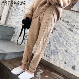 MATAKAWA Pantaloni Harem lavorati a maglia Modelli autunnali e invernali Pantaloni larghi spessi coreani Elastico in vita Twist Ravanello Pantaloni di lana Donna 210513