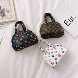 Korean version of foreign girls' messenger bag 2020 summer printed Mini Princess shell bag portable decorative zero wallet