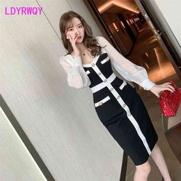 French retro Hepburn lantern sleeve dress female winter ladies temperament black and white stitching bag hip 210416