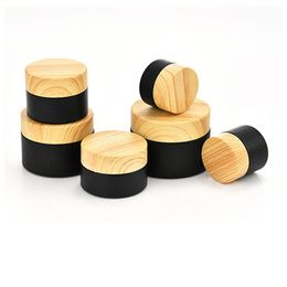 2021 5g 10g 15g 20g 30g 50g Black Frosted Glass Jars Cosmetic Bottle Cream Container with Imitated Wood Grain Plastic Lids