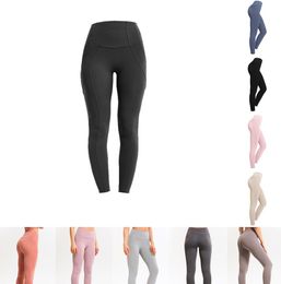 legging Pantaloni da yoga a 9 colori colore puro sollevamento dell'anca broccato bifacciale Yiwu splicing Leggings sportivi da fitness a 11 punti per le donne