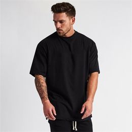 Gym Clothing Fitness Mens Oversized T Shirt Men Hip Hop Sportswear Loose Half Sleeve T-shirt Muscle Man Bodybuilding Tshirt 210409