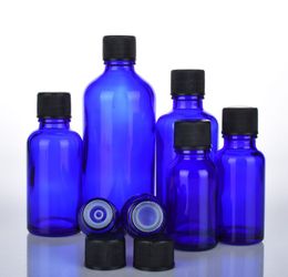 Essential oil bottle 100ml 50m 30ml 20ml 15ml 10ml 5ml 1/3oz 1oz Dark Blue glass Bottles With Black Cap Glass Containers