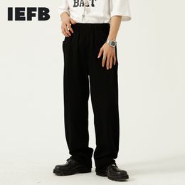 IEFB Men's Clothing Summer Causal Pants Korean Loose Solid Color Trend Personalized Elastic Waist Black White Trousers 210524