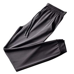 Men's Casual Black Ice Silk Pants Cool And Comfortable Breathable lace-up Pockets Drawstring Trousers Y0811