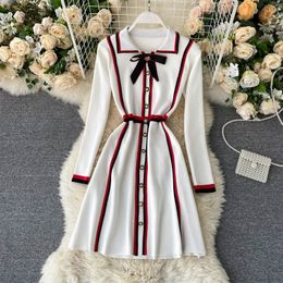 Women French Knitted Dress Autumn Winter Sweet Bow Button Elastic A-line Dress Korean Fashion Streetwear Dress 210419