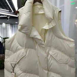 FMFSSOM Loose Causal 90% White Duck Down Jacket Women Sleeveless Asymmetric Length Beige Spring Autumn Windpoof Basic Outwear 211018