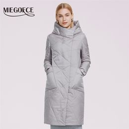 MIEGOFCE Spring Women's Coat Oblique Design Women Autumn Hooded Jacket Large Pockets Side Zipper Casual Windproof Parka 210819