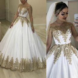 2021 Luxury Bling Dubai White Gold Ball Gown Wedding Dresses Bridal Formal Gowns Sheer Long Sleeves Off Shoulder Bateau Neck Appliqued Sparkly Glitter Sequins Lace