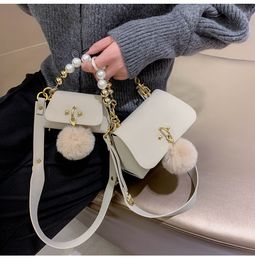 Luxury Kids pearl handbags Designer woman Girls pompom Metal Chain single shoulder Bag Mother and daughter Messenger bags F323