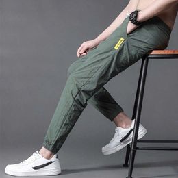 New Fashion Thin Style Ankle-Length Pencil Pants Men Polyester Ice Silk Loose Pants Summer Casual Sweatpants Sports Joggers Grey Y0927