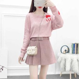 Autumn winter 2 piece suit Set Loose heart pullover sweater +Pink High waist woolen Skirt with belt Women Casual Clothes 210529