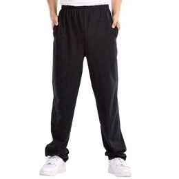 Taglia 7XL 140KG Uomo Pantaloni sportivi in cotone economici semplici autunno Pantaloni elastici neri Pantaloni casual da casa da uomo Pantaloni dritti Y0811