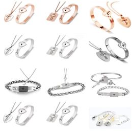 2pcs Titanium Matching Couple Bracelet Necklace Set Heart Lock Bracelet and Key Pendant Necklace for Men and Women