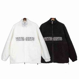 Wittermong Winter Events Embroidered Letters Men's and Women's Uygur Lamb Wool Warm Coat