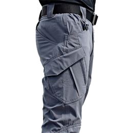 Mens Tactical Pants Multiple Pocket Elasticity Military Urban Tacitcal Trousers Men Slim Fat Cargo Pant 5XL 211120
