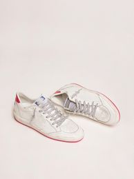 Small Golden Dirty Italy Low Top Shoes Designer Luxury Italian Retro Handmade Ball Star Ltd Sneakers in White Leather with Red Patent Leather Detail