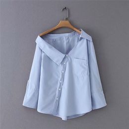 est women stylish solid blue irregular skew collar blouse long sleeve buttons decorate shirts elegant female tops 210226