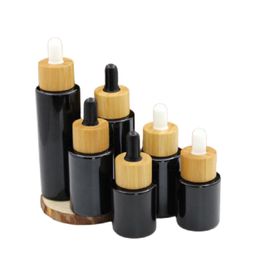 Portable Luxury Glossy Black Cosmetic Packaging Bottle Empty Glass Dropper Essential Oil Vials Bamboo Woode Ring Lid Refillable Containers 20ml 30ml 40ml 60ml