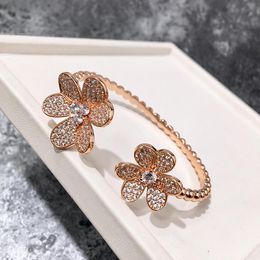 European bangle and American cross-border hot selling round bead edge bracelet trilobal flower six petal flower full diamond opening double
