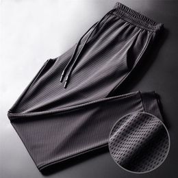 Men's Summer Ice Silk Pants Mesh Breathable men's Casual Thin Sports Plus Size Slim Trousers Loose 220330